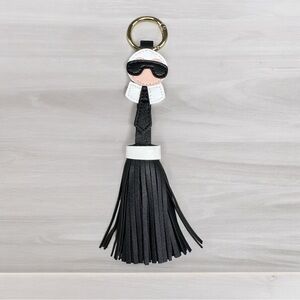 Man wearing sunglasses leather 7” keychain Purse charm tassel black white new